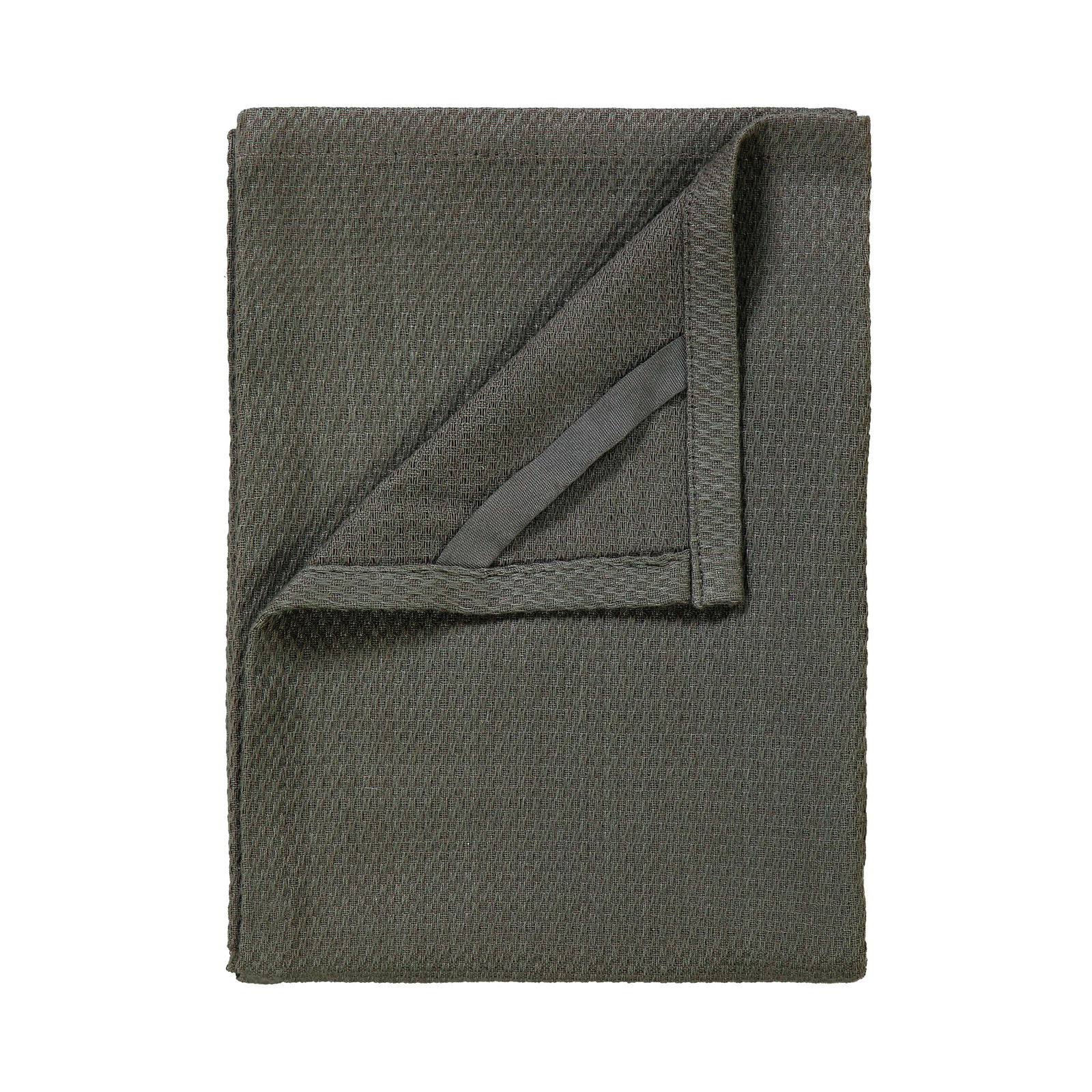 Soft green woven blanket folded on a white background, perfect for cozying up.