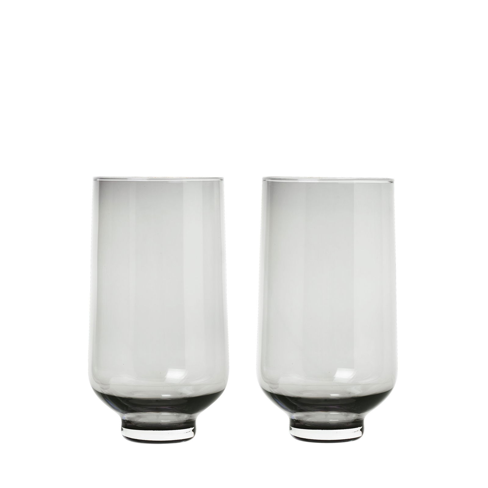 Two elegant glass tumblers with a modern design on a black background.