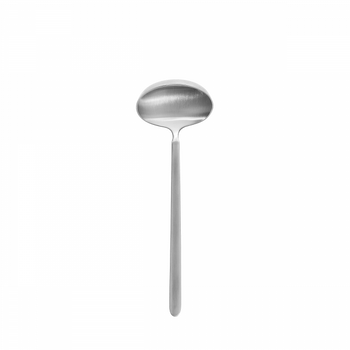 Shiny stainless steel soup ladle on a black background.