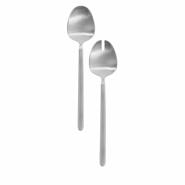 Stylish stainless steel serving spoons with sleek design on a black background.