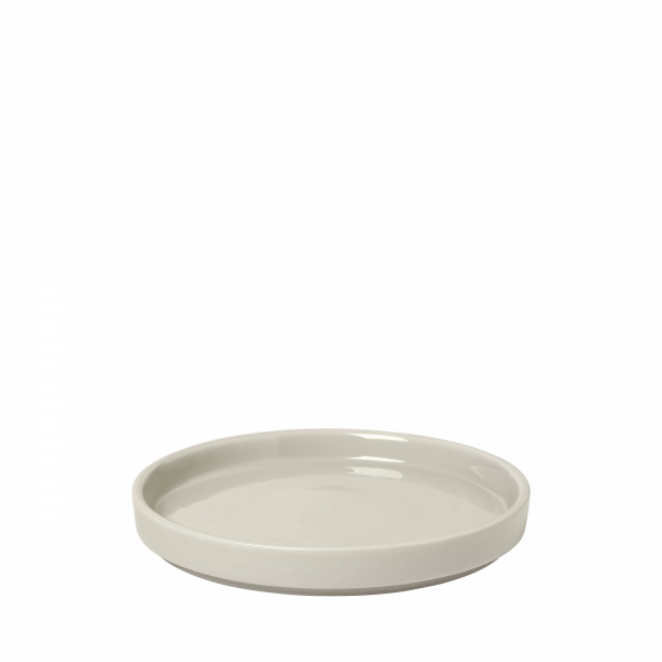 Minimalistische runde Keramikplatte in sanftem Grauton, perfekt zum Servieren oder für die Dekoration.