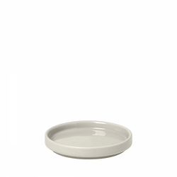 Minimalist ceramic plate in soft gray ideal for serving or decorative purposes.