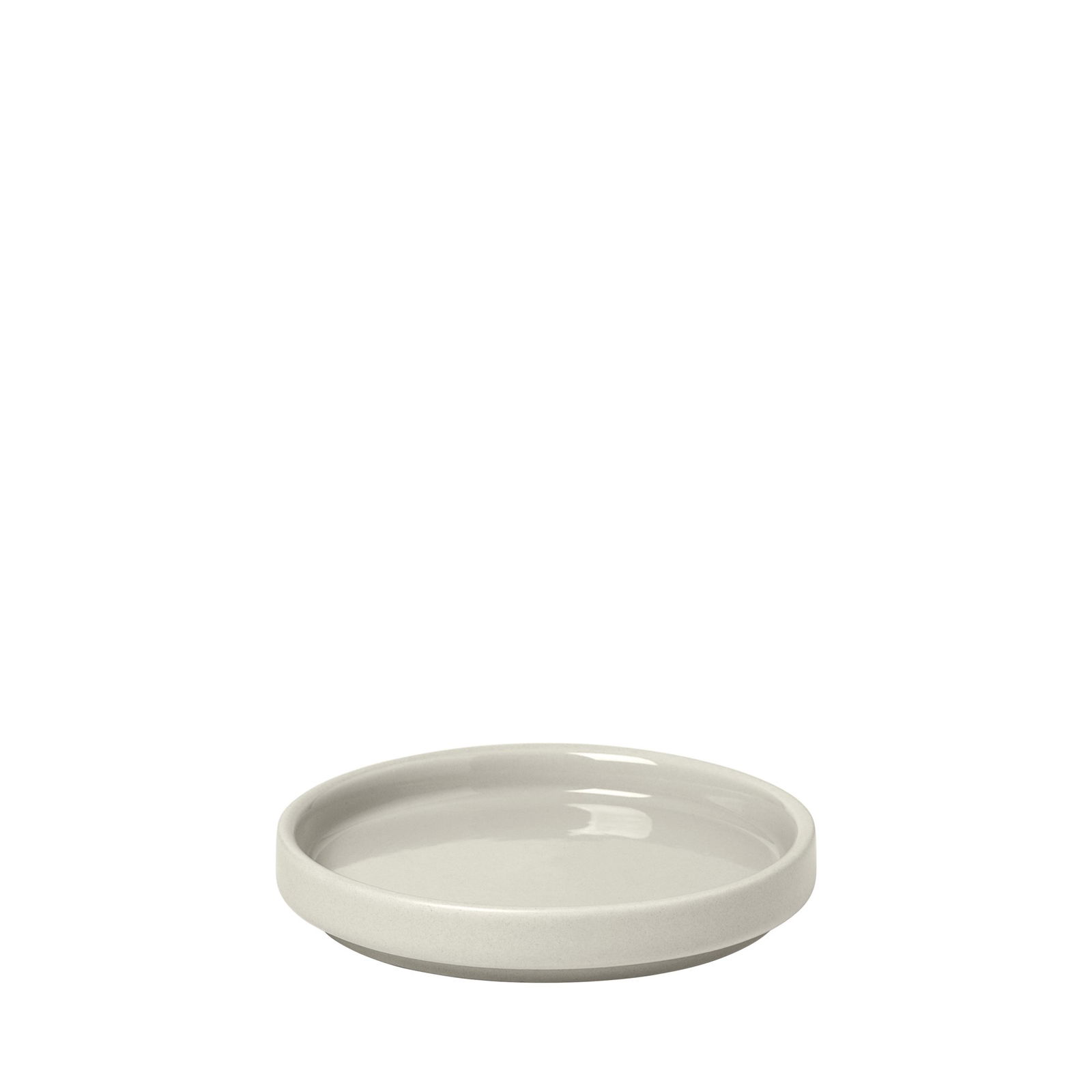 Minimalist ceramic plate in soft gray ideal for serving or decorative purposes.