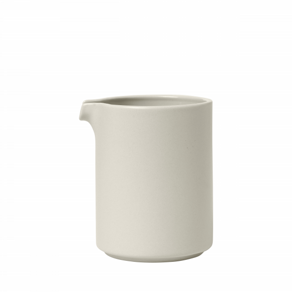 Minimalist white ceramic pitcher with a smooth finish and subtle pour spout.