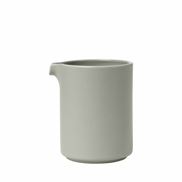 Minimalist gray ceramic pitcher on a simple black background.