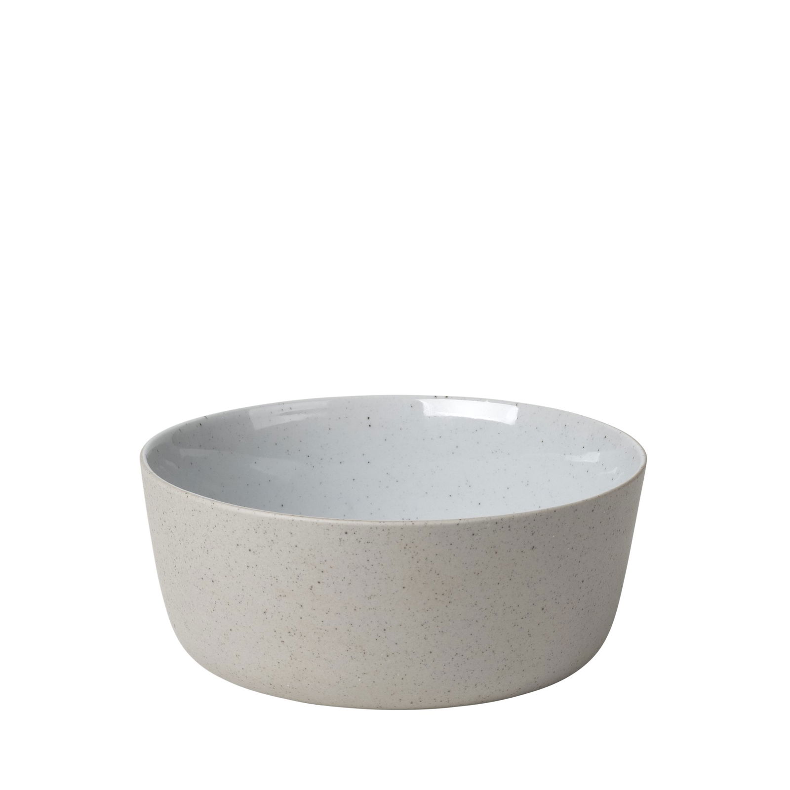 Minimalist white ceramic bowl with a speckled finish on a black background.