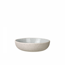 Elegant ceramic bowl with a speckled design against a black background.