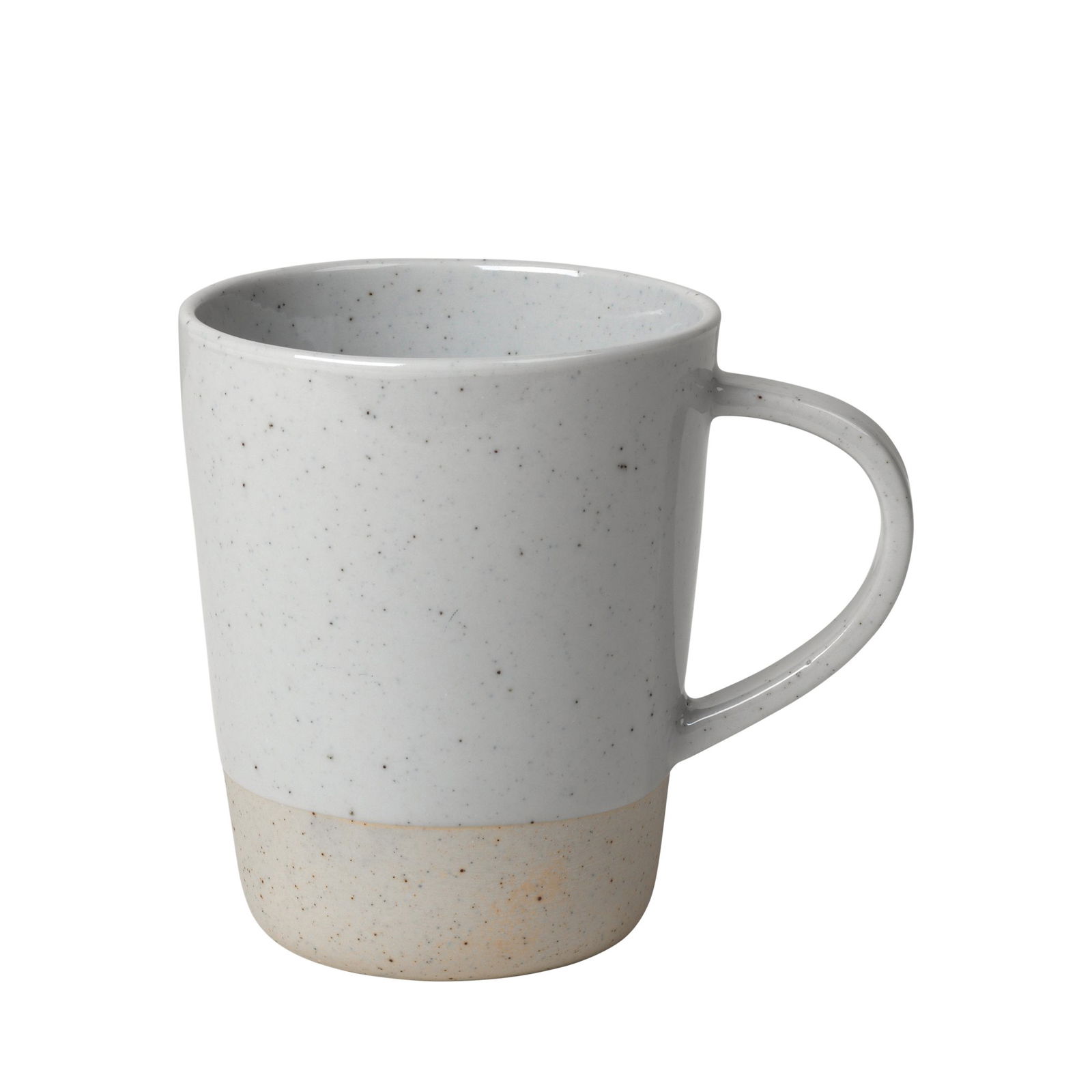 Keramiktasse mit einem gesprenkelten Design und einem kontrastierenden Akzent aus natürlichem Ton auf schwarzem Hintergrund.