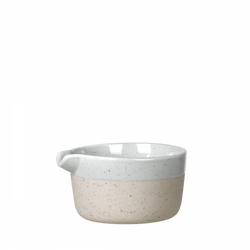 Stylish two-tone ceramic bowl with a smooth finish ideal for serving or decoration.