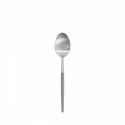 Silver stainless steel spoon on a black background, showcasing its elegant design.