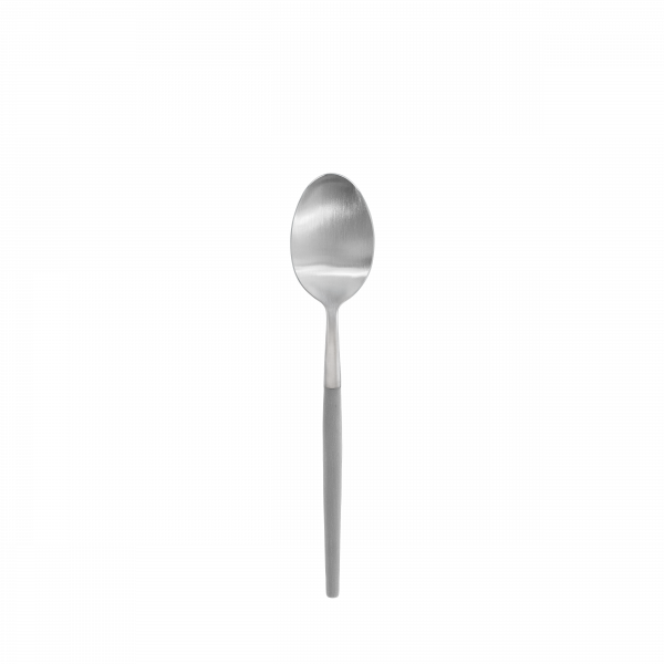 Silver stainless steel spoon on a black background, showcasing its elegant design.