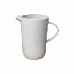 Minimalist ceramic pitcher featuring a speckled gray and beige design.