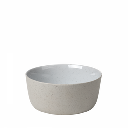 Simple white ceramic bowl with a speckled finish on a white background.