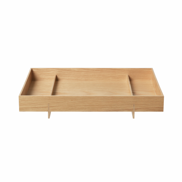 Minimalist wooden tray with three compartments for organizing items elegantly.