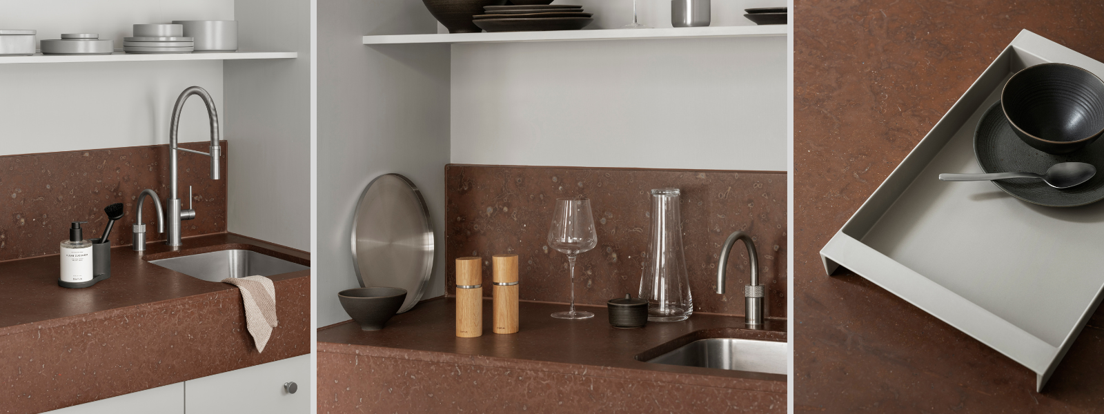 Moderne Küche mit braunem Naturstein, stilvollen Küchenutensilien und elegantem Geschirr.